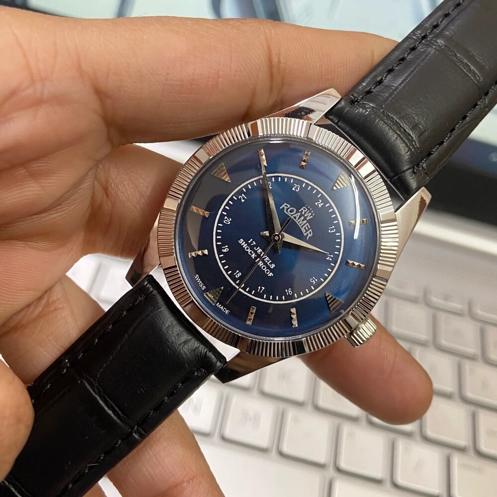 Vintage 1980 Roamer Manual Mens Silver Watch W/Fluted Bezel & Blue accents
